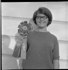 Girl with ribbon for First Premium Crop Show, Junior Tobacco Show, Wilson NC 1966 